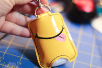DBB Smiley Face with Tongue Hand Sanitizer Holder Snap Tab Version In the Hoop Embroidery Project 1 oz BBW for 5x7 hoops