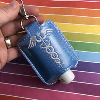 DBB Caduceus Hand Sanitizer Holder Snap Tab Version In the Hoop Embroidery Project 2 oz DT for 5x7 hoops