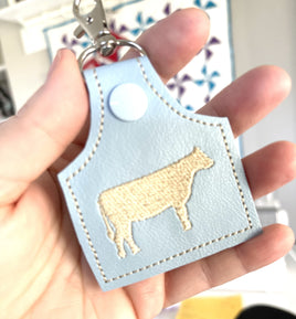 DBB Cow tag shape with MINI COW snap tab for 4x4 hoops