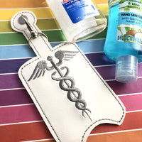 DBB Caduceus Hand Sanitizer Holder Snap Tab Version In the Hoop Embroidery Project 3 oz DT for 5x7 hoops